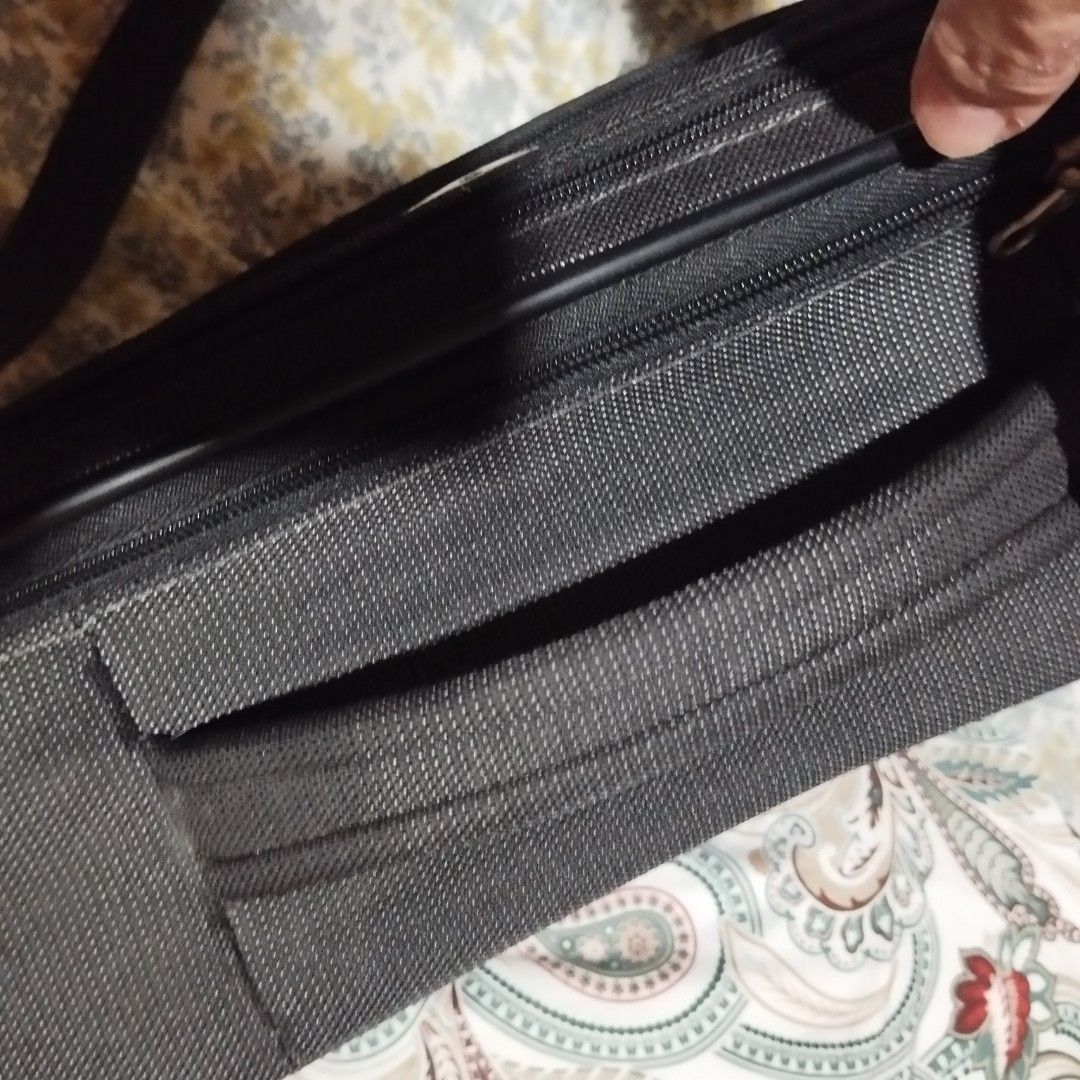 Samsonite Black Business Briefcase Bag with Shoulder Strap (Category: Briefcases) located in Manila. Submitted by lene48 (Listing ID 1465049937, Image 3). Description: - Brand: Samsonite - Color: Classic Black - Material: Sturdy, durable fabric with premium metal hardware - Compartments: Multiple zippered compartments and front pockets for maximum organization - Carry Options: Top carry handle and adjustable padded shoulder strap - Condition: Wel