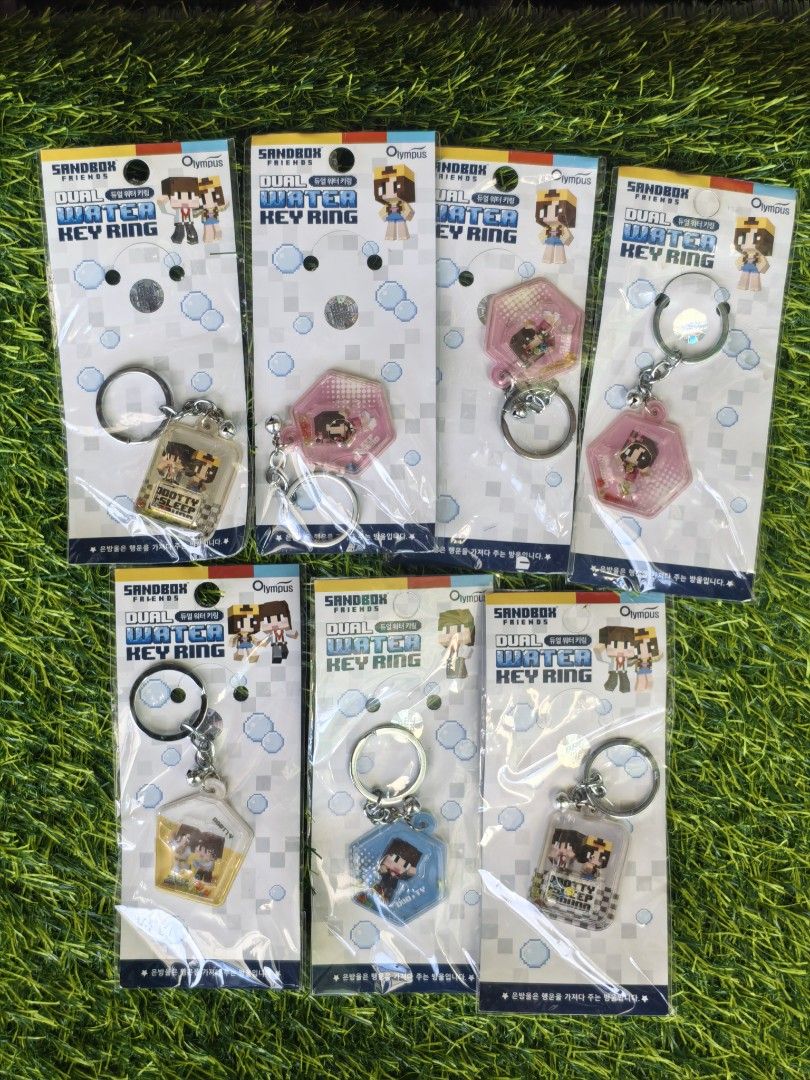 Sandbox Friends Dual Water Key Ring Assorted Designs (Category: Character Goods) located in Paranaque City. Submitted by furugiyafinds (Listing ID 1465038815, Image 1). Description: - Official Olympus merchandise: Sandbox Friends dual water key ring collection - Multiple character designs available in hexagonal and rectangular liquid cases - Fun pixel art graphics inside the floating water compartments - Brand new in original packaging with heade