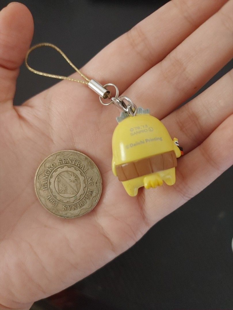 Sanrio Hello Kitty yellow duck charm strap (Category: Character Goods) located in Antipolo. Submitted by itsklaus (Listing ID 1465033367, Image 2). Description: Hello Kitty phone strap/ keychain sisiw protecting hello kitty :) 8/10 still cute mop: gcash buyer to shoulder del fee location: antipolo.