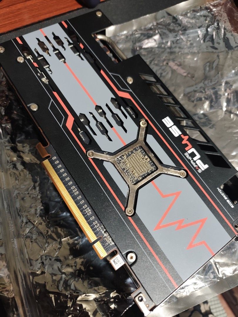 Sapphire Pulse AMD Radeon RX 5700 XT (Category: Computer Parts) located in Antipolo. Submitted by trixii (Listing ID 1464985230, Image 2). Description: - Model: Sapphire Pulse AMD Radeon RX 5700 XT - Cooling: Dual-fan setup with stylish black/red shroud and graphic backplate - Condition: Clean, well-maintained, and ready for your gaming rig - Performance Tested: Scored 8464 points at 141 FPS in FurMark - Temperatures: Reached a max of 76°C under 