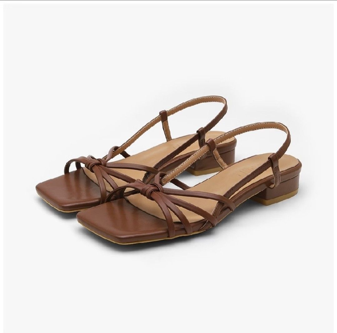 SAPPUN kimer strap flat sandals (Category: Heels) located in Manila. Submitted by anniemazing (Listing ID 1465102989, Image 1). Description: SAPPUN sandals bought from Korea (2cm) Style: Square toe with delicate knotted front straps and ankle slingback Color: Brown Size: 38 (240mm) (US7) Heel: Low block heel for all-day comfort Inclusions: Extra heel grip pads included + selling coz mejo tight sa feet ng daughter ko, she has slightly wide feet + 