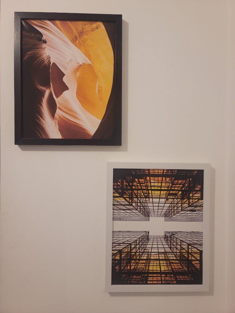 Set of Two Framed Wall Art Prints (Category: Frames & Pictures) located in Manila. Submitted by kamilleale02863 (Listing ID 1465143604, Image 1). Description: - Set of 2 stylish framed wall art pieces - Piece 1: Canyon landscape in a sleek black frame - Piece 2: Architectural skyscraper pattern in a clean white frame - Ready to hang in the living room, bedroom, or office - Perfect for modern home styling .