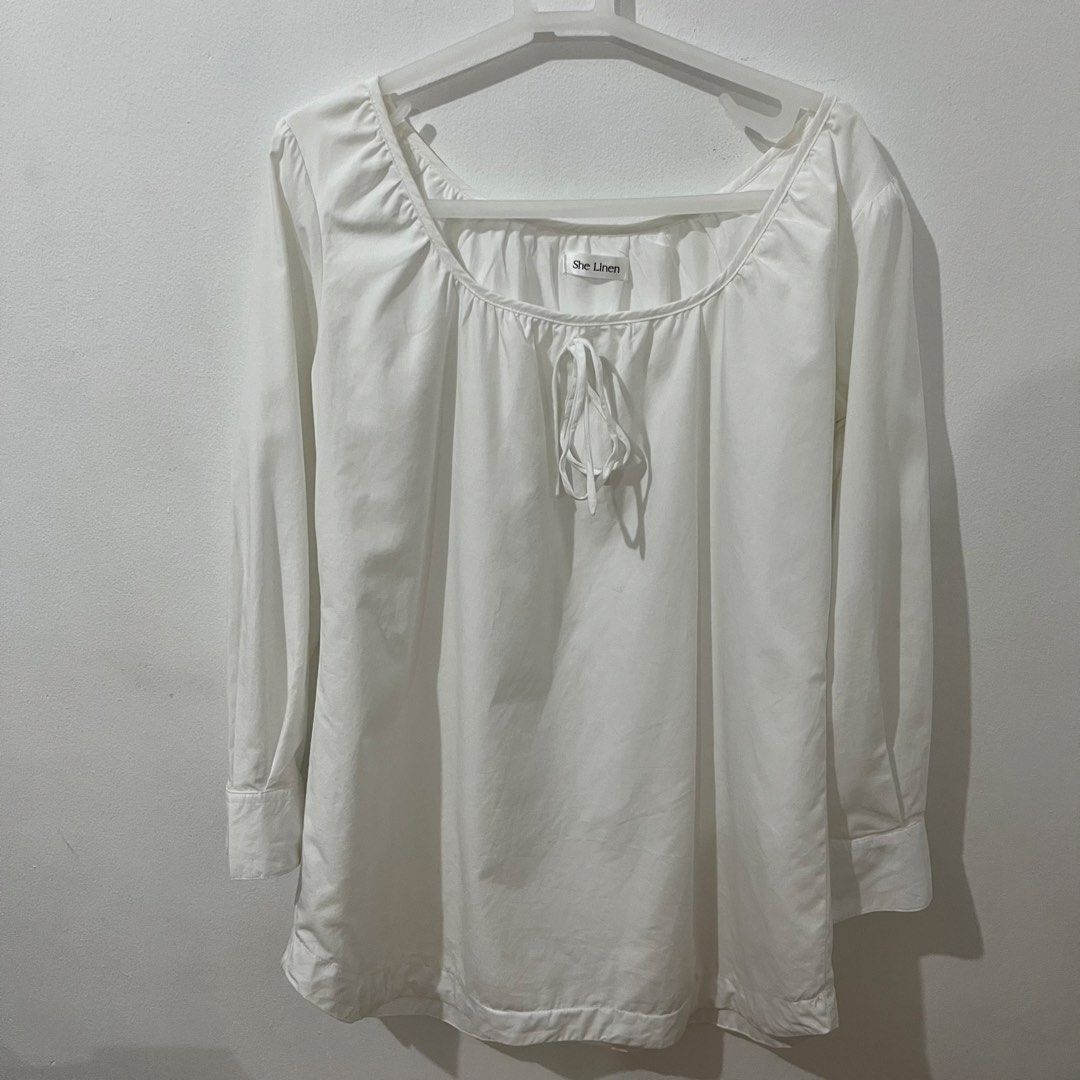 She Linen White Square Neck Long Sleeve Blouse (Category: Longsleeves) located in Cavite. Submitted by jeklitam07235 (Listing ID 1465105072, Image 2). Description: - Brand: She Linen - Color: White - Style: Long sleeve blouse with square neckline and front drawstring tie - Fit: Relaxed fit - Styling: Pairs great with denim or shorts.