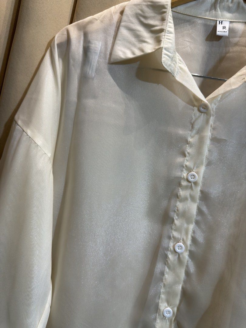 Sheer Button Down Longsleeve (Category: Longsleeves) located in Manila. Submitted by glamstylemnl (Listing ID 1465145762, Image 2). Description: ♡ SIZE: XXL ♡ BUST: 48 ♡ Swipe left to see the actual color & details ♡ relaxed and oversized fit / lightweight fabric ♡ HQ • 10/10 ♡ Ready to wear 👚.