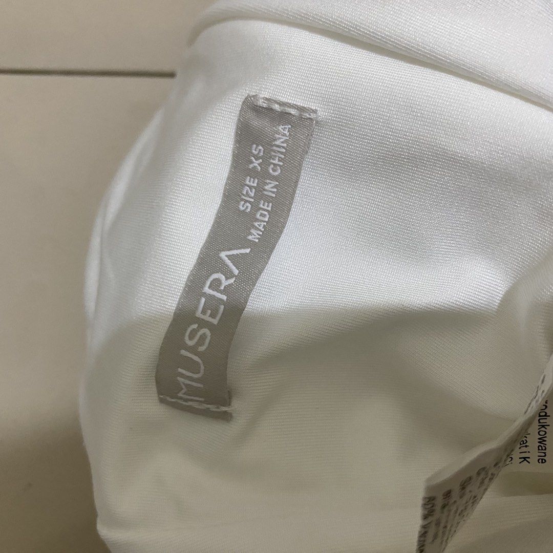 SHEIN White Corset Top (Category: Sleeveless) located in Quezon City. Submitted by lovelylittlepreloves (Listing ID 1464978976, Image 3). Description: never been worn.