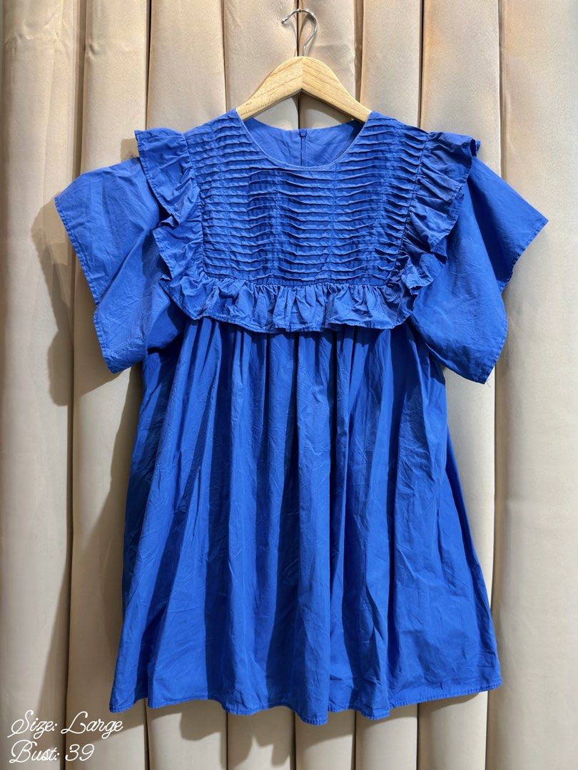 Shirring Blouse (Category: Blouses) located in Manila. Submitted by glamstylemnl (Listing ID 1465135978, Image 1). Description: ♡ SIZE: L ♡ BUST: 39 ♡ Swipe left to see the actual color & details ♡ pleated and smoked yoke / ruffled trim detail / relaxed flared fit ♡ HQ • 10/10 ♡ Ready to wear 👚.