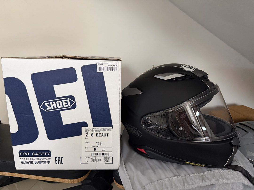 Shoei Z-8 Motorcycle Full Face Helmet MEDIUM (Category: Helmets and other Riding Gears) located in Manila. Submitted by troddetrading (Listing ID 1463390449, Image 2). Description: - Shoei Z-8 Full Face Helmet - Color: Matte Black with a cool graphic design - Visor: Comes with a clear visor - Inquiries: Feel free to ask any questions!.