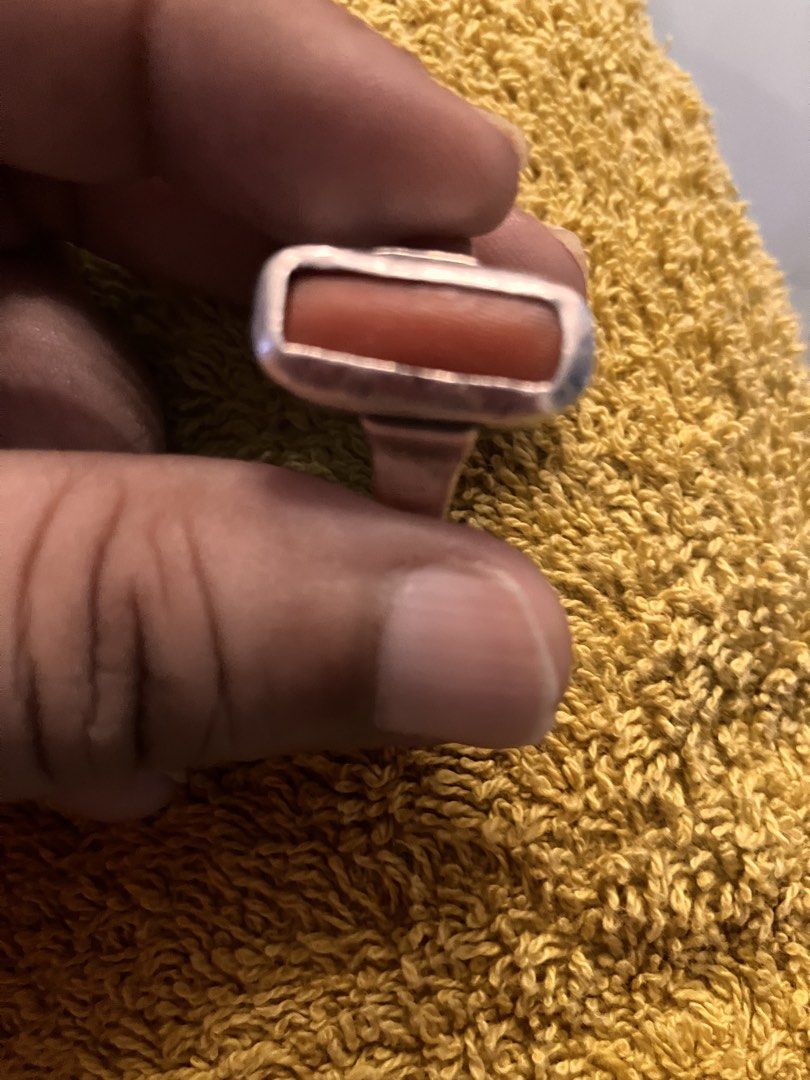 Silver Rectangular Red coral Ring (Category: Rings) located in Kuala Lumpur. Submitted by prithwish296594 (Listing ID 1465063586, Image 1). Description: - Bold silver ring design - Features a striking rectangular red coral (natural) in a bezel setting - Smooth metal band with simple sides - Solid and sturdy construction - Makes a great statement piece on the finger Ring Size : 18 Metal : Silver .