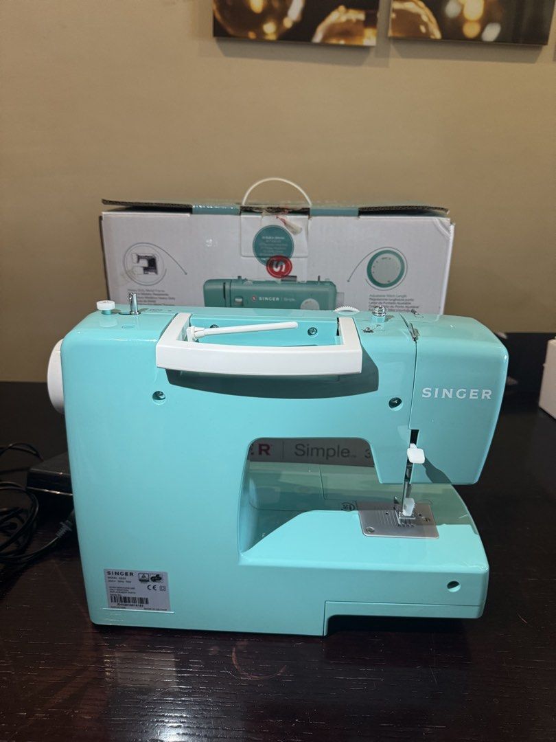 Singer Simple 3223 Sewing Machine Mint Green (Category: Craft Supplies & Tools) located in Mandaluyong City. Submitted by dmbalberon39973 (Listing ID 1465017503, Image 2). Description: - Model: Singer Simple 3223 Sewing Machine - Color: Mint Green - Features: 23 built-in stitches, adjustable stitch length, and heavy-duty metal frame inside - Ideal for: Sewing projects, clothing repairs, and DIY crafts - Inclusions: Original box, power cable, and 