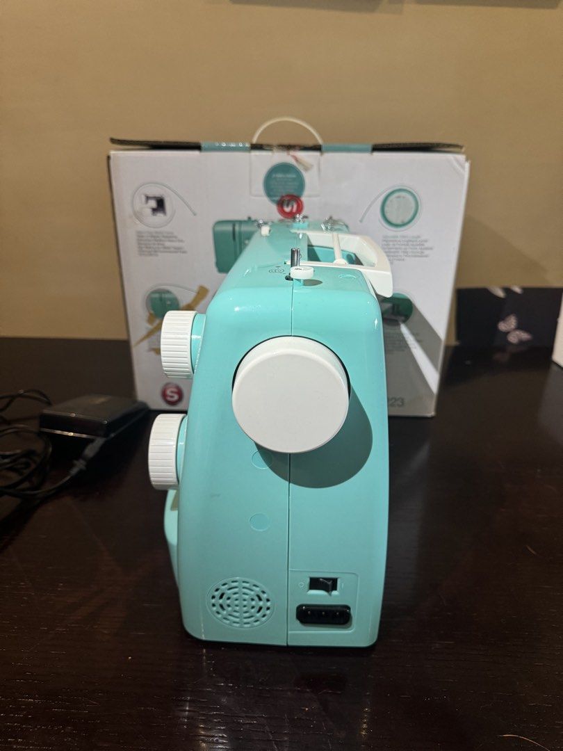 Singer Simple 3223 Sewing Machine Mint Green (Category: Craft Supplies & Tools) located in Mandaluyong City. Submitted by dmbalberon39973 (Listing ID 1465017503, Image 3). Description: - Model: Singer Simple 3223 Sewing Machine - Color: Mint Green - Features: 23 built-in stitches, adjustable stitch length, and heavy-duty metal frame inside - Ideal for: Sewing projects, clothing repairs, and DIY crafts - Inclusions: Original box, power cable, and 
