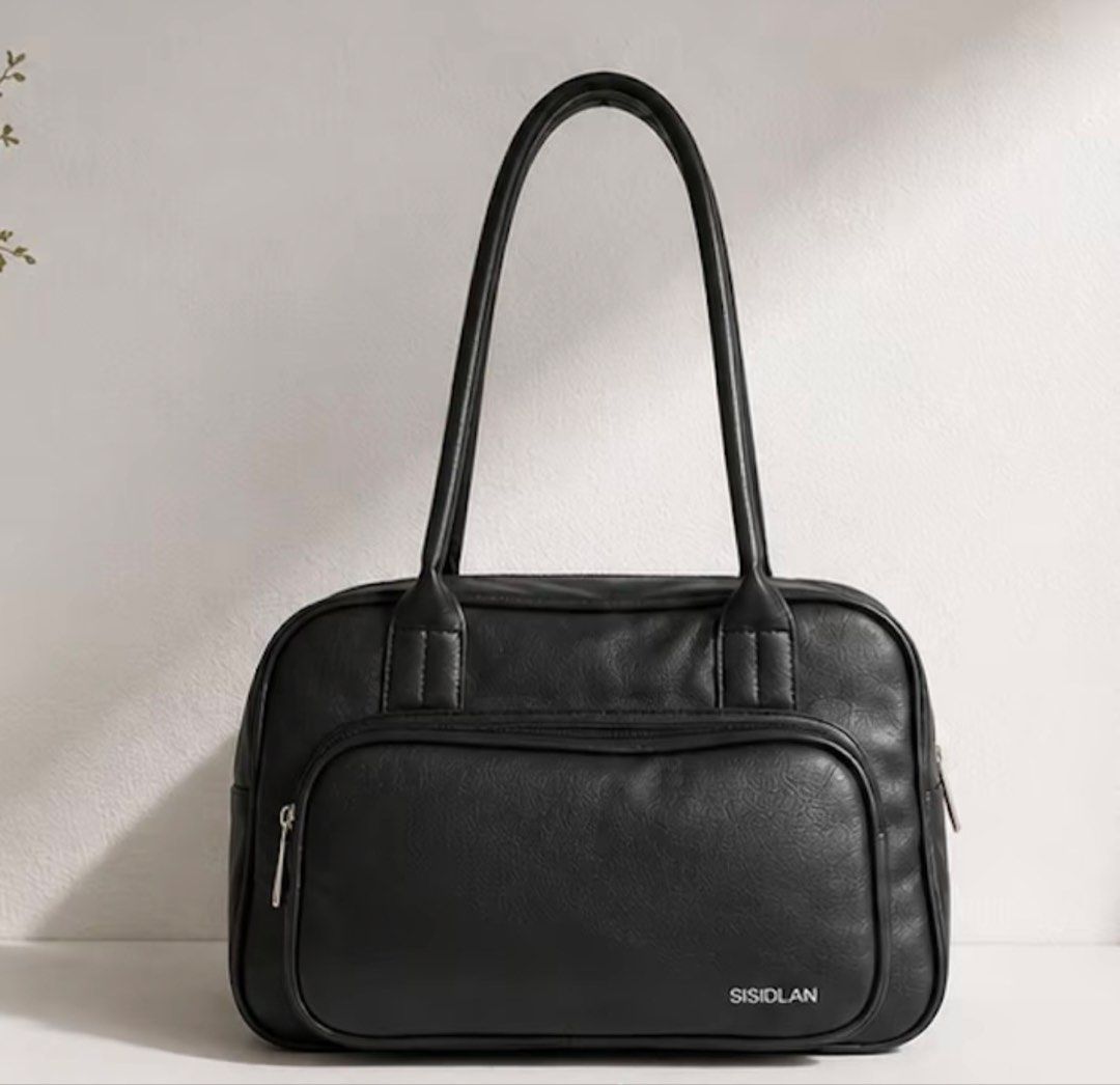 SISIDLAN MELINDA BOWLER BAG (Category: Shoulder Bags) located in Antipolo. Submitted by lovedbyjessa (Listing ID 1465146588, Image 3). Description: lighly used use only for 3 weeks training message me for actual pictures rfs : hindi na nagagamit Mode of Payment : Gotyme Mode of Delivery : Lalamove or JNT Location: Upper Antipolo, Rizal. .