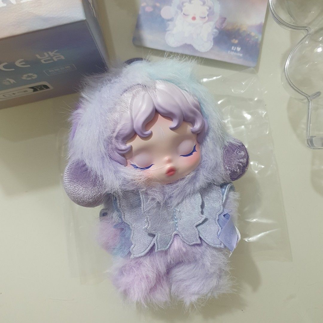 Skullpanda L'impressionnisme Plush Doll Lightning (Category: Plushies & Soft Toys) located in Caloocan City. Submitted by euni.clo (Listing ID 1465000940, Image 2). Description: - Item: Skullpanda L'impressionnisme Series (Lightning Design) - Condition: Pristine, unboxed only to check the design - Features: Soft purple and blue fur with intricate face sculpt - Inclusions: Original box, ID card, and clear plastic display capsule - Authentic and we