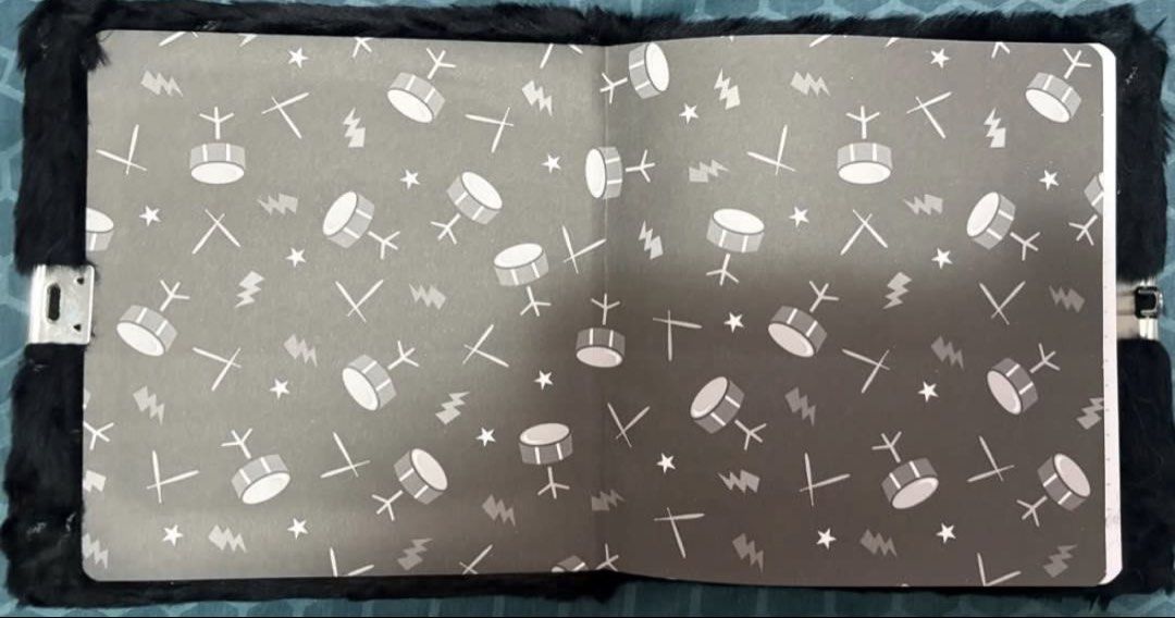 Smiggle Black Fluffy Notebook Diary with Lock (Category: Stationery & School Supplies) located in Manila. Submitted by bwshoppe (Listing ID 1465022758, Image 3). Description: - Brand: Smiggle - Cover: Black fluffy, soft furry material with logo patch - Pages: Lined with cool drum and lightning border patterns - Security: Attached side lock included - Condition: Brand new / Excellent - Perfect for: Journaling, secret notes, or as a gift.