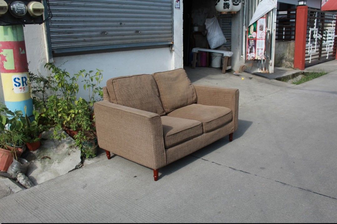 Sofa (Category: Sofas) located in Meycauayan. Submitted by marygracecasimiro (Listing ID 1465118295, Image 3). Description: RELAX FORM 2-Seater Fabric Loveseat Sofa Neutral taupe-brown tweed-style upholstery, with loose seat and back cushions, straight track arms and elegant turned wooden legs. A stylish Japanese sofa with Italian-inspired design, perfect for living rooms or cozy spaces L:56 • W:35 • Seat H:17 • Back H:36 • inches 12,900 pesos on