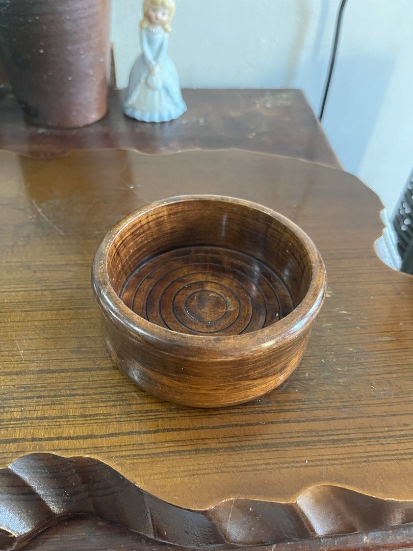 Solid wood Small Bowl Catchall Trinket Dish (Category: Vases & Decorative Bowls) located in Taguig. Submitted by minmin_parker (Listing ID 1465051963, Image 1). Description: - Material: Smooth polished wood with a rich brown finish - Design: Unique concentric circle grooves inside - Versatile Use: Great as an entryway catch-all for keys and coins, or a desk organizer for small items - Compact Size: Handy tray that fits easily on any table top - C