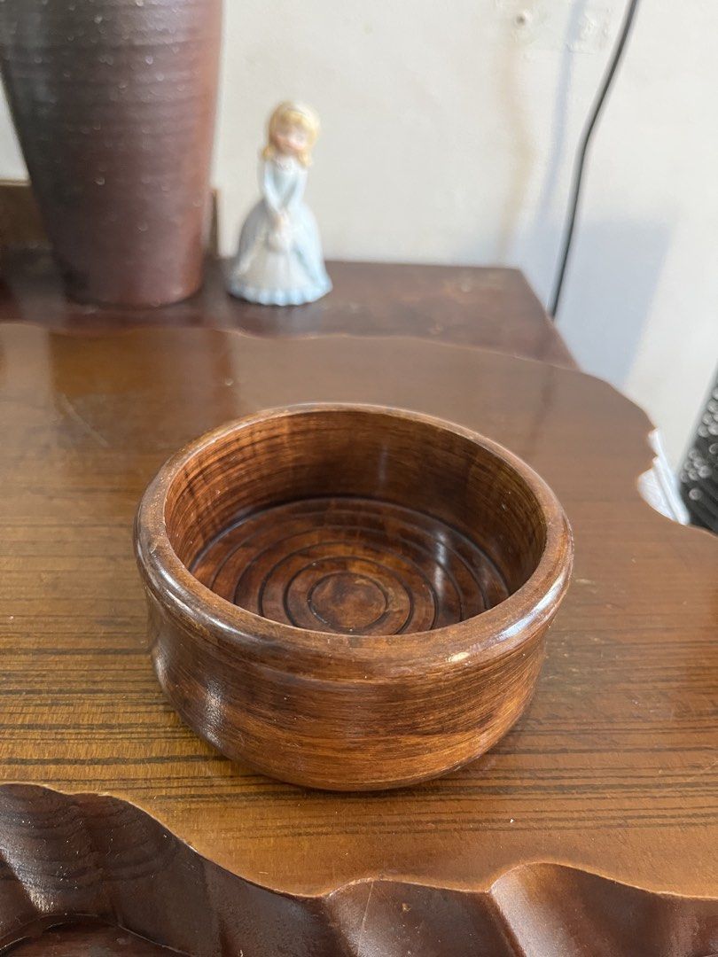 Solid wood Small Bowl Catchall Trinket Dish (Category: Vases & Decorative Bowls) located in Taguig. Submitted by minmin_parker (Listing ID 1465051963, Image 3). Description: - Material: Smooth polished wood with a rich brown finish - Design: Unique concentric circle grooves inside - Versatile Use: Great as an entryway catch-all for keys and coins, or a desk organizer for small items - Compact Size: Handy tray that fits easily on any table top - C