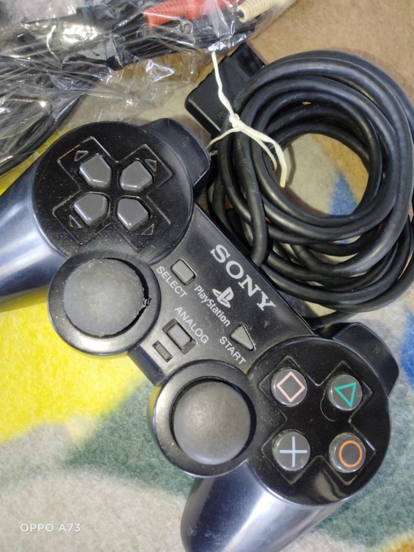 Sony PlayStation 2 DualShock 2 Analog Controller with Cables (Category: Controllers) located in Davao. Submitted by olkindsofstuff.ph (Listing ID 1464988083, Image 2). Description: - Authentic.