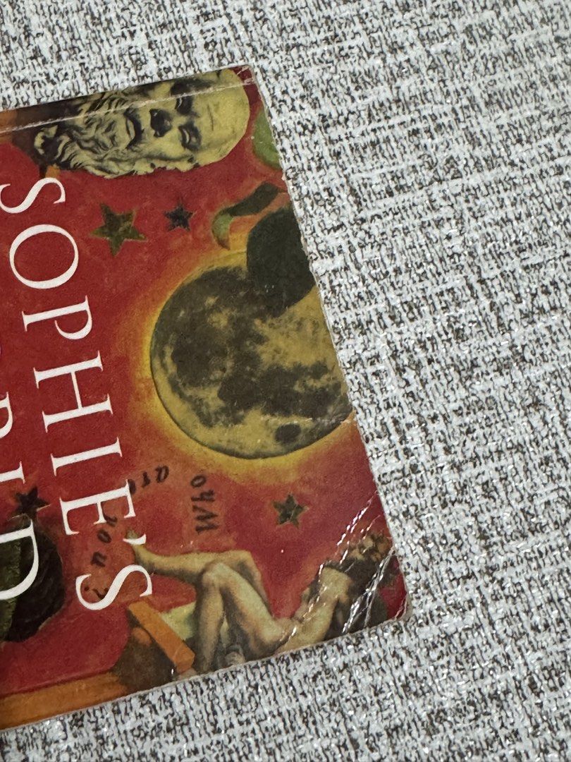 Sophie's World by Jostein Gaarder Paperback (Category: Storybooks) located in Cavite. Submitted by yourpahinagirly (Listing ID 1464991008, Image 3). Description: - Title: Sophie's World by Jostein Gaarder - Format: Paperback with classic cover art - Condition: Pre-loved, natural yellowing of pages, with creases on the cover corners and spine edge - Readability: 100% readable, clean text - About: A fantastic and engaging introduction to the histor