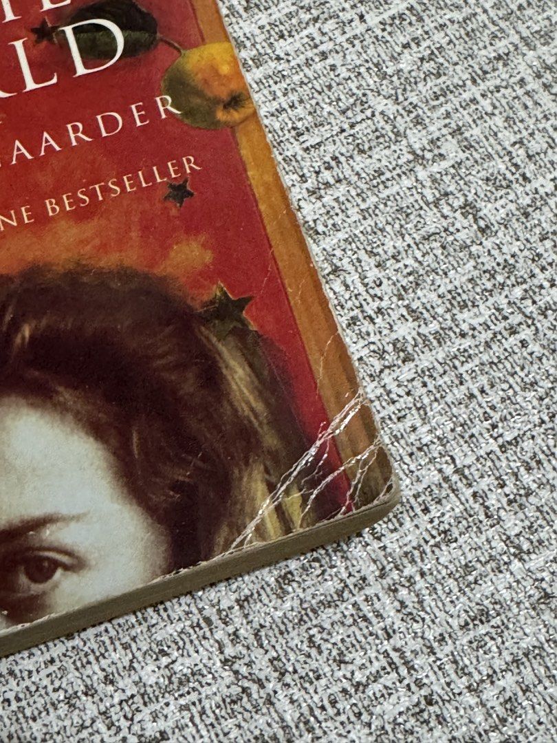 Sophie's World by Jostein Gaarder Paperback (Category: Storybooks) located in Cavite. Submitted by yourpahinagirly (Listing ID 1464991008, Image 2). Description: - Title: Sophie's World by Jostein Gaarder - Format: Paperback with classic cover art - Condition: Pre-loved, natural yellowing of pages, with creases on the cover corners and spine edge - Readability: 100% readable, clean text - About: A fantastic and engaging introduction to the histor