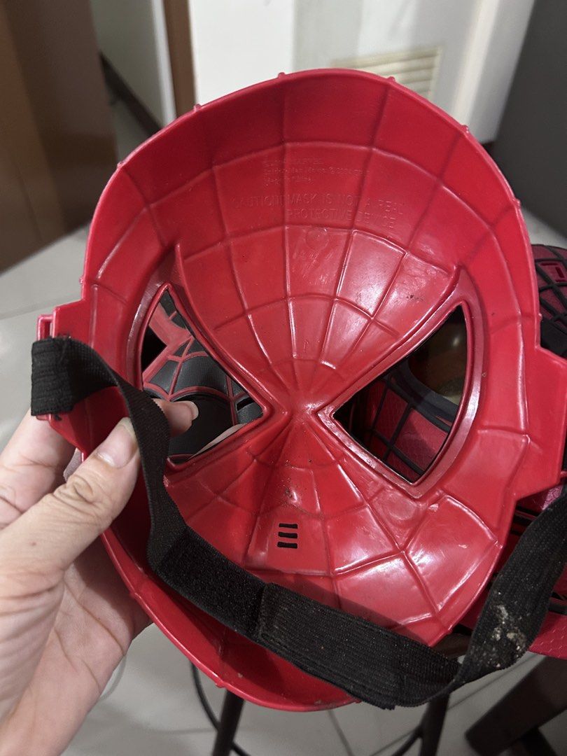 Spider-Man Plastic Costume Mask Marvel Collectible (Category: Western Merchandise) located in Manila. Submitted by elnemeeh_05 (Listing ID 1465020073, Image 1). Description: - Official 2004 Marvel Enterprises collectible Spider-Man mask - Classic web pattern with comfortable eye cutouts - Secure elastic strap at the back for a snug fit - Available in striking Red and Black colorways - Ideal for costume parties, cosplay, or fan displays - Conditio