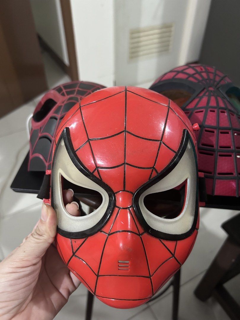 Spider-Man Plastic Costume Mask Marvel Collectible (Category: Western Merchandise) located in Manila. Submitted by elnemeeh_05 (Listing ID 1465020073, Image 3). Description: - Official 2004 Marvel Enterprises collectible Spider-Man mask - Classic web pattern with comfortable eye cutouts - Secure elastic strap at the back for a snug fit - Available in striking Red and Black colorways - Ideal for costume parties, cosplay, or fan displays - Conditio