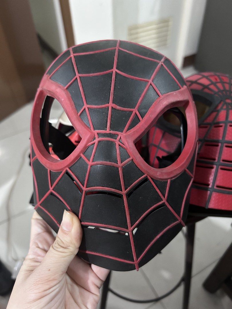 Spider-Man Plastic Costume Mask Marvel Collectible (Category: Western Merchandise) located in Manila. Submitted by elnemeeh_05 (Listing ID 1465020073, Image 2). Description: - Official 2004 Marvel Enterprises collectible Spider-Man mask - Classic web pattern with comfortable eye cutouts - Secure elastic strap at the back for a snug fit - Available in striking Red and Black colorways - Ideal for costume parties, cosplay, or fan displays - Conditio