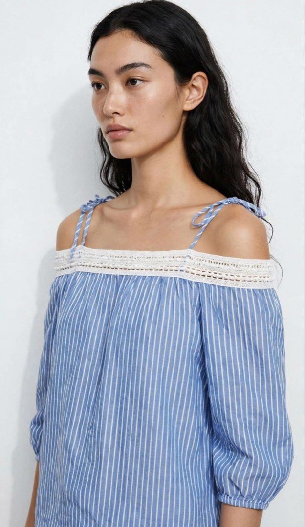 Springfield Blue & White Striped Off-Shoulder Blouse (Category: Blouses) located in Manila. Submitted by kgdecluttercloset (Listing ID 1452623893, Image 1). Description: .