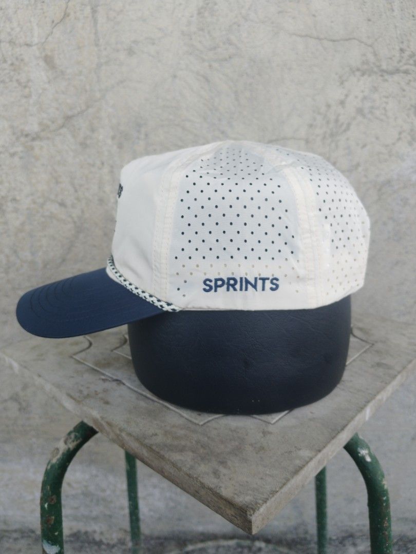 Sprints Running Supply Co. Hat (Category: Caps & Hats) located in Legazpi City. Submitted by genobecollectives (Listing ID 1464974490, Image 3). Description: Sprints Running Supply running hats 400 each plus sf pag aspack 700 free ship - Design: Embroidered leopard and buffalo front panels with contrasting braided rope - Colors: White perforated crown and navy blue brim - Fit: Adjustable snapback closure (One size fits most) - Material: Lightweig