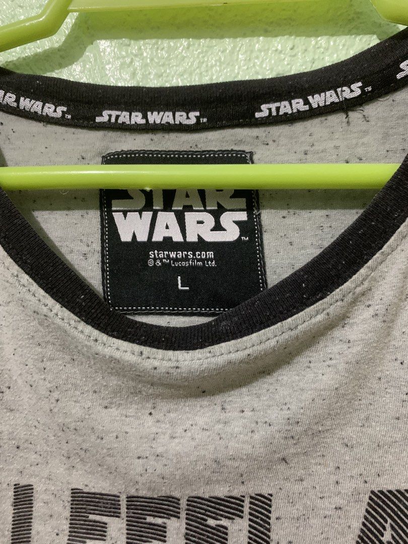 Star Wars Darth Vader T-Shirt (Category: Tshirts & Polo Shirts ) located in Daraga. Submitted by ryrilim (Listing ID 1464998596, Image 2). Description: - Authentic Star Wars merchandise - Color: Heather grey with speckled effect - Front graphic: Darth Vader with "I feel a disturbance in the force" text - Details: Contrasting black ribbed collar and Star Wars branded inner neck taping - Size: Large - Material: Comfortable cotton blend.