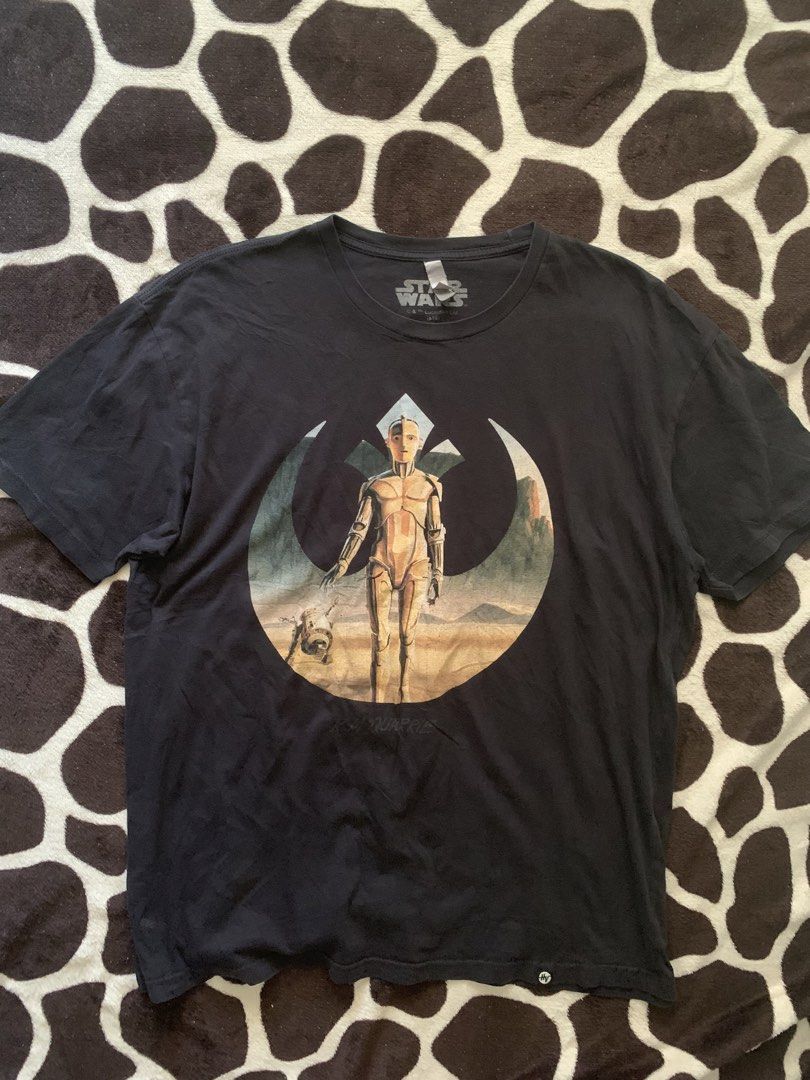 Star Wars Graphic Tee (Category: Tshirts & Polo Shirts ) located in Kabacan. Submitted by nevr_outofstyle (Listing ID 1465080096, Image 1). Description: Star Wars Graphic Tee 📐 Details W- 23” L- 29.5” Color Rate: 9/10 issue: cracked print MOP: Gcash 🚚 J&T Buyer will shoulder delivery fee.