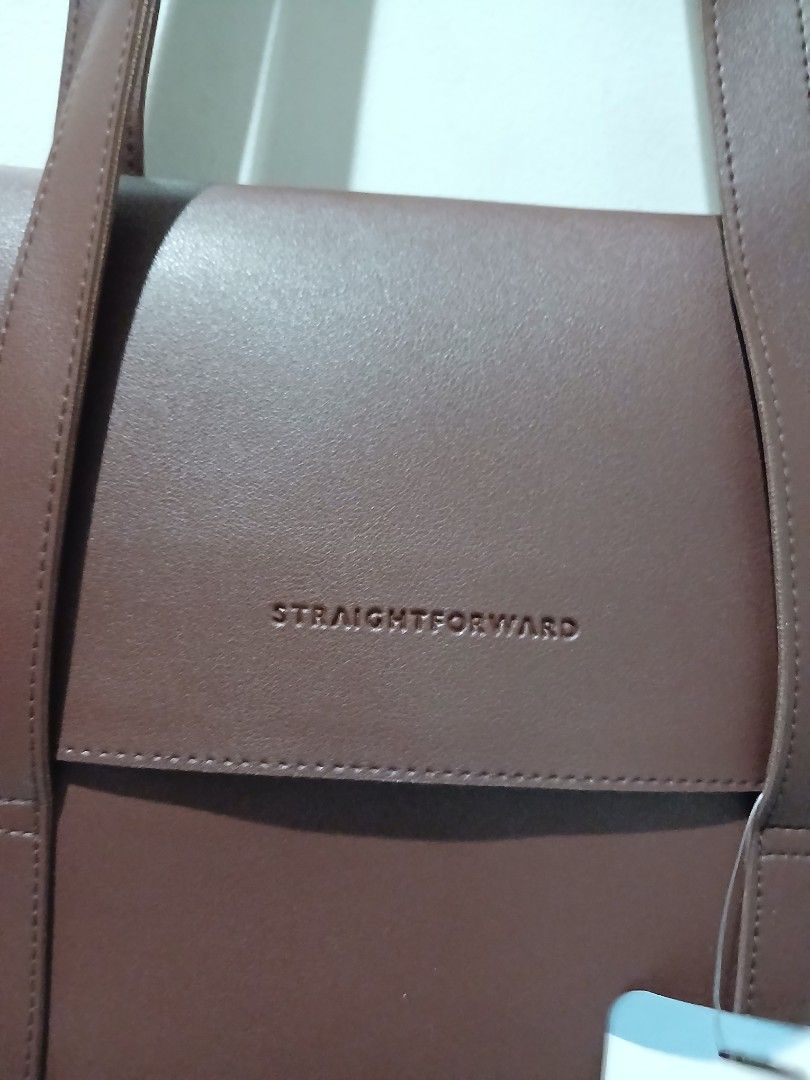Straightforward DVL Lacina Chestnut Tote Bag (Category: Tote Bags) located in Pasig City. Submitted by carmelaelizalde (Listing ID 1465142732, Image 2). Description: Christmas gift / Office bag / School bag - Brand new with tag - Material: Rich dark brown faux leather with sturdy shoulder straps - Design: Front flap closure with embossed brand logo - Measurements: Approx. 15.5 inches across x 14 inches down RFS: impulse buy ^^.
