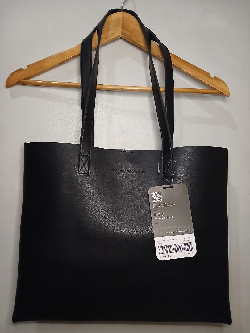 Straightforward DVL Landscape Tote Bag Black (Category: Tote Bags) located in Pasig City. Submitted by carmelaelizalde (Listing ID 1465140338, Image 1). Description: Christmas gift / office bag / school bag - Brand new with tag - Interior: Features a convenient slip pocket with a snap button closure - Dimensions: Roughly 16 inches wide x 13 inches high RFS: nakatago lang, di pa nagamit.