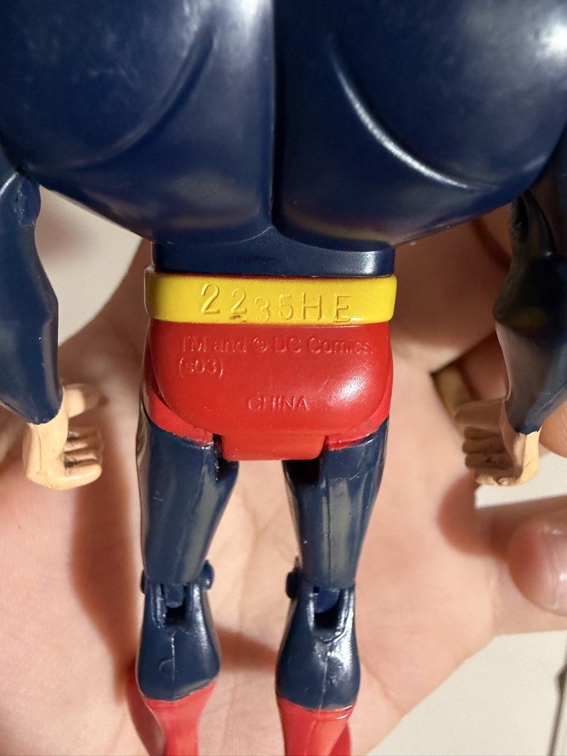 Superman Binary Code Action Figure DC Comics 2003 (Category: Figurines & Statues) located in Plaridel. Submitted by moddedjarvis (Listing ID 1465170688, Image 3). Description: - Classic animated series style Superman action figure - Unique suit covered in binary code prints - Features a yellow belt and red boots - Joints on arms and legs move properly - Minor paint scuffs from handling and play - Stamped TM and © DC Comics (03) on the back - Made