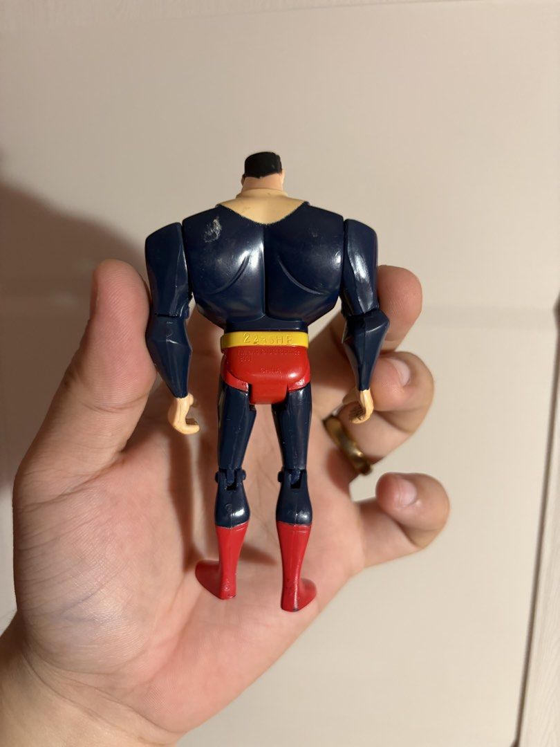 Superman Binary Code Action Figure DC Comics 2003 (Category: Figurines & Statues) located in Plaridel. Submitted by moddedjarvis (Listing ID 1465170688, Image 2). Description: - Classic animated series style Superman action figure - Unique suit covered in binary code prints - Features a yellow belt and red boots - Joints on arms and legs move properly - Minor paint scuffs from handling and play - Stamped TM and © DC Comics (03) on the back - Made