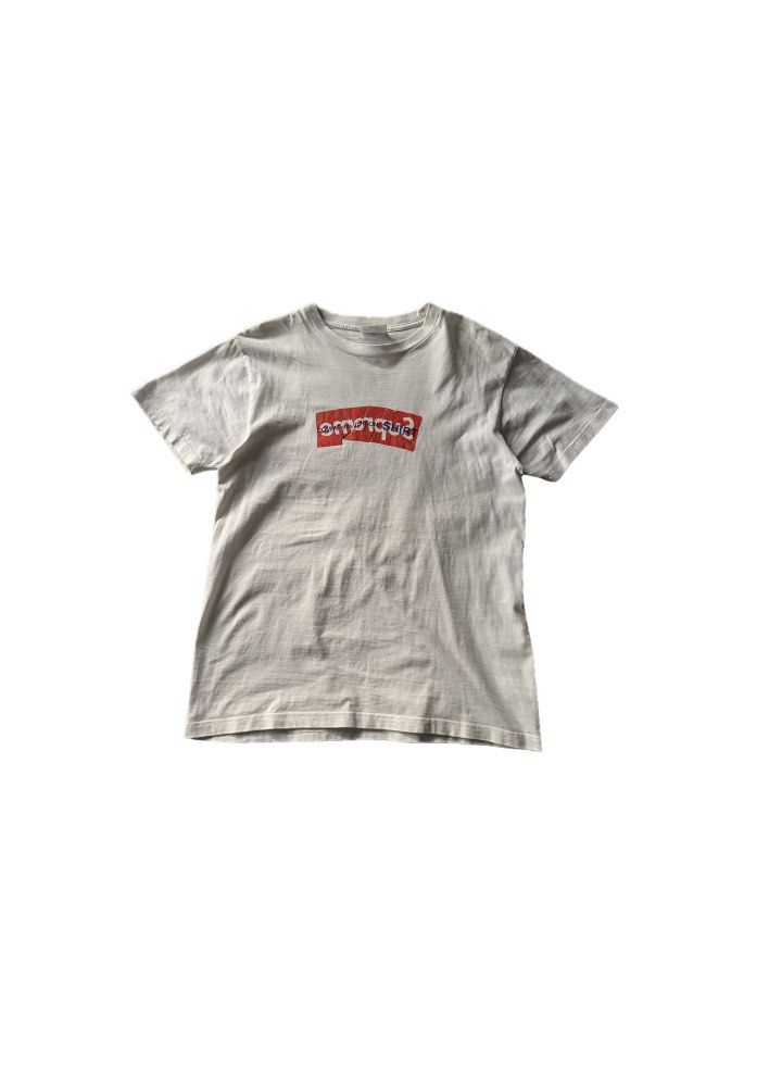 Supreme Comme des Garcons SHIRT Split Box Logo Tee (Category: Tshirts & Polo Shirts ) located in Cabanatuan. Submitted by archive.stuffz (Listing ID 1464971230, Image 1). Description: - Brand: Supreme x Comme des Garcons SHIRT - Color: White - Design: Iconic red and blue split box logo - Fit: Classic crew neck, short sleeves - Material: Comfortable cotton - Condition: Minor natural wear shown throughout, authentic hyped streetwear piece -SMALL .