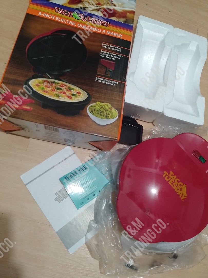 Taco Tuesday 8-Inch Electric Quesadilla Maker (Category: Cookware & Accessories) located in Pasig City. Submitted by mara_0125 (Listing ID 1465011233, Image 3). Description: - Brand new, never used, and still wrapped in original plastic - Comes complete with original box, styrofoam inserts, and manual - 8-inch non-stick cooking surface with 6-wedge sections for easy slicing - Two-position latch accommodates both thin and thick fillings - Perfect 