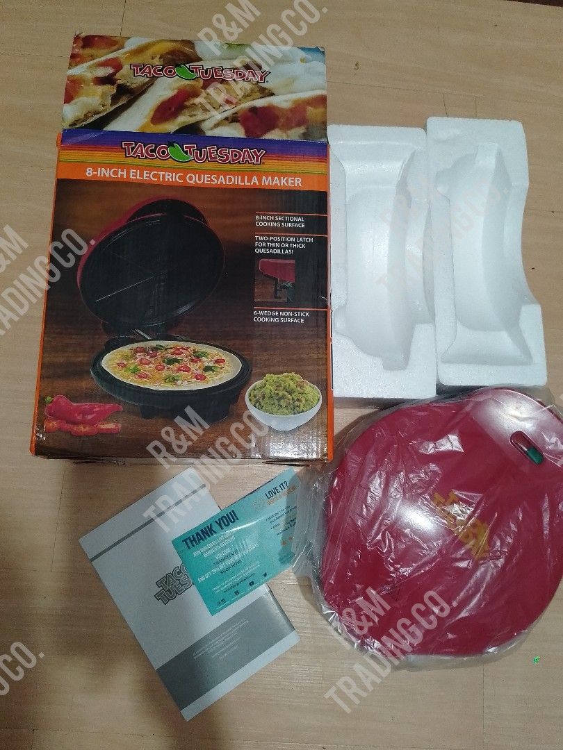 Taco Tuesday 8-Inch Electric Quesadilla Maker (Category: Cookware & Accessories) located in Pasig City. Submitted by mara_0125 (Listing ID 1465011233, Image 1). Description: - Brand new, never used, and still wrapped in original plastic - Comes complete with original box, styrofoam inserts, and manual - 8-inch non-stick cooking surface with 6-wedge sections for easy slicing - Two-position latch accommodates both thin and thick fillings - Perfect 