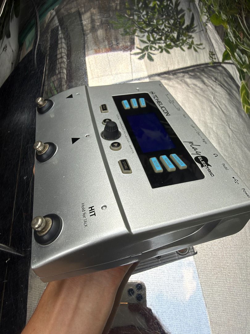 TC-Helicon Play Electric Vocal and Guitar Effects Processor (Category: Musical Instruments) located in Caloocan City. Submitted by sol_vinzon (Listing ID 1465168136, Image 3). Description: Details: - Sleek silver chassis featuring a central LCD screen, multi-function footswitches, control knobs, and preset buttons - Comprehensive rear I/O panel including mic in, guitar in/out, aux, outputs, headphone jack, and power connection - Condition: 9/10. 