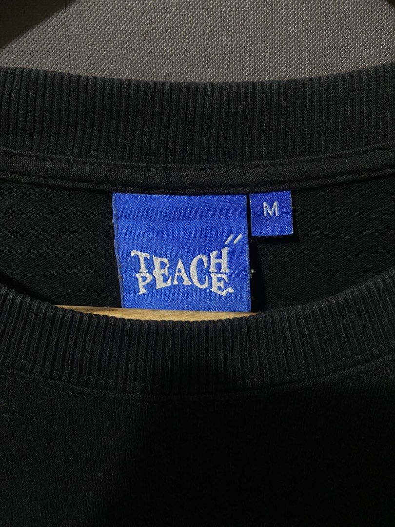 TEACH AND PEACH SHIRT (Category: Tshirts & Polo Shirts ) located in Angeles City. Submitted by tianthrifts_ (Listing ID 1465033135, Image 2). Description: WTS! TEACH X PEACH SHIRT LARGE WIDTH: 23 LENGTH: 27 CONDITION: 9.8/10 COLOR RATE: 9.8/10 ISSUE: NONE 550.