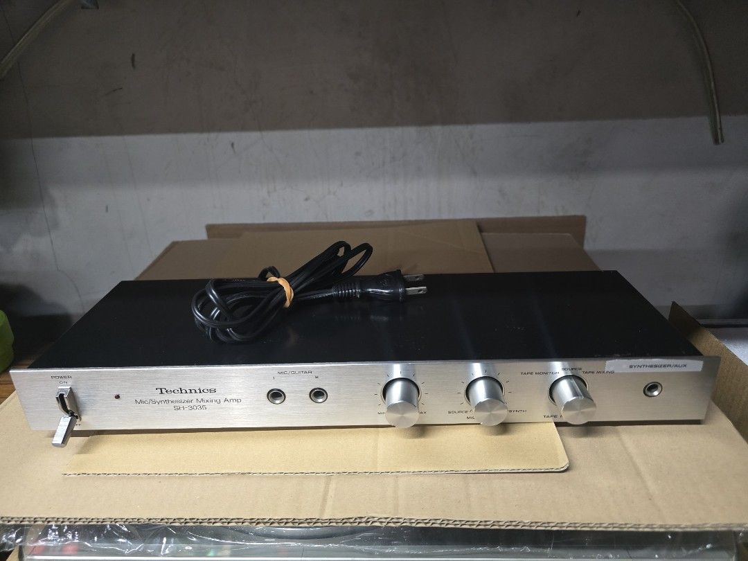 Technics SH-3035 Mic / Synthesizer Mixing Amp (Category: Musical Instruments) located in Caloocan City. Submitted by Lan_cab (Listing ID 1465058141, Image 1). Description: - Vintage Technics SH-3035 microphone and synthesizer mixing amp - Made in Japan by Matsushita Electric - Front panel features dual mic and guitar jacks with rotary control knobs - Rear includes standard RCA connections for line in, line out, rec out, and playback - Power ratin