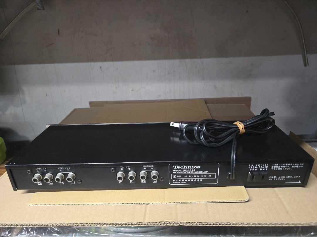 Technics SH-3035 Mic / Synthesizer Mixing Amp (Category: Musical Instruments) located in Caloocan City. Submitted by Lan_cab (Listing ID 1465058141, Image 2). Description: - Vintage Technics SH-3035 microphone and synthesizer mixing amp - Made in Japan by Matsushita Electric - Front panel features dual mic and guitar jacks with rotary control knobs - Rear includes standard RCA connections for line in, line out, rec out, and playback - Power ratin