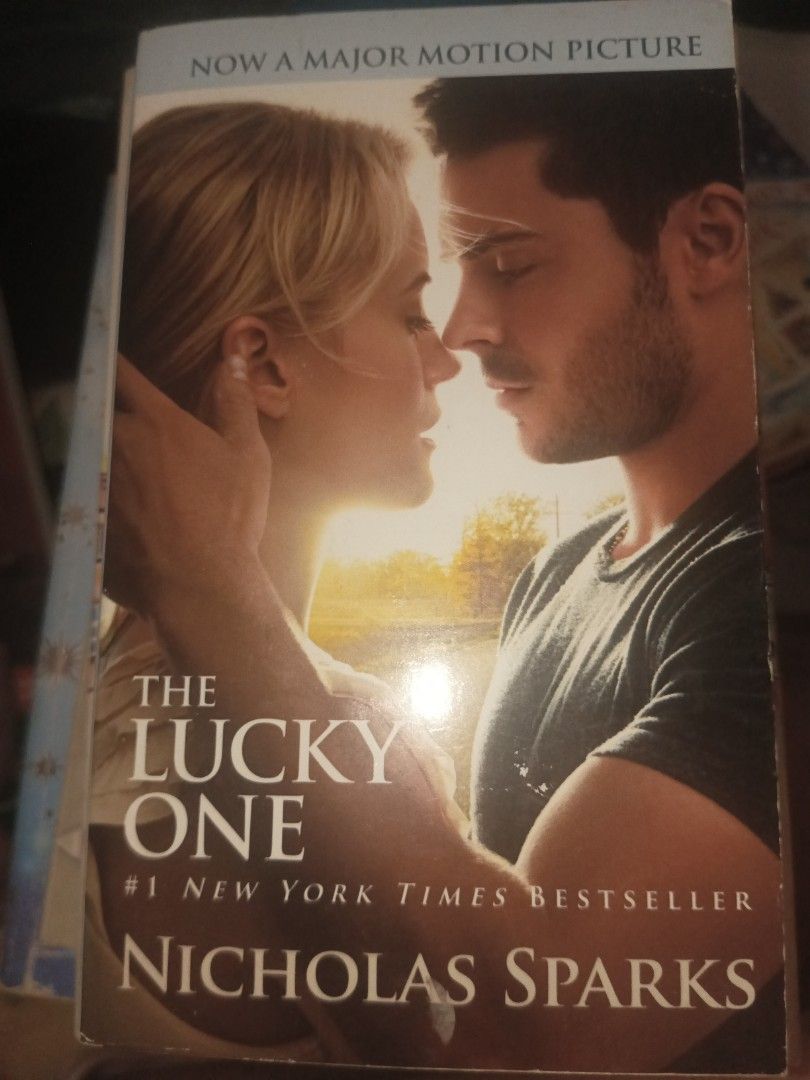THE LUCKY ONE - NICHOLAS SPARKS (Category: Storybooks) located in General Mariano Alvarez. Submitted by sellsheebooks (Listing ID 1465026681, Image 1). Description: can do orange co.