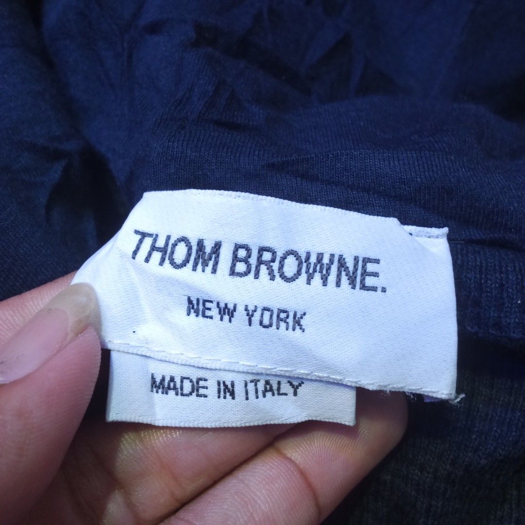 Thom b hoodie (Category: Coats, Jackets and Outerwear) located in Manila. Submitted by tcbukay_zxc25 (Listing ID 1465035016, Image 2). Description: Thom Browne hoodie size 2 makpal tela. issue stain guhit lang.