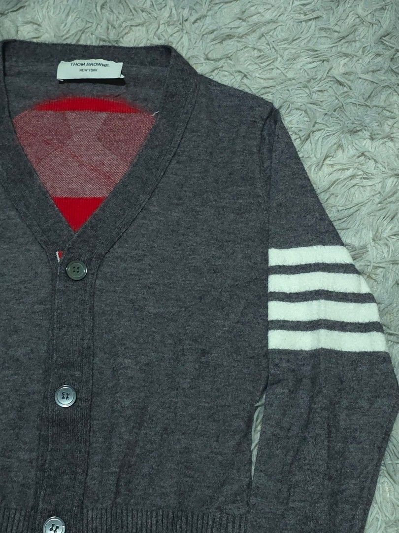 Thom Browne Knitted Cardigan (Category: Coats, Jackets and Outerwear) located in Abulug. Submitted by humanwhosellthings (Listing ID 1464972083, Image 3). Description: THOM BROWNÈ Womens Cardigan ✅️Size: Small ✅️Dimes: 17.5W x 22L ✅Condition: Excellent ✅Issue: None ✅Color Rate: 9.8/10.