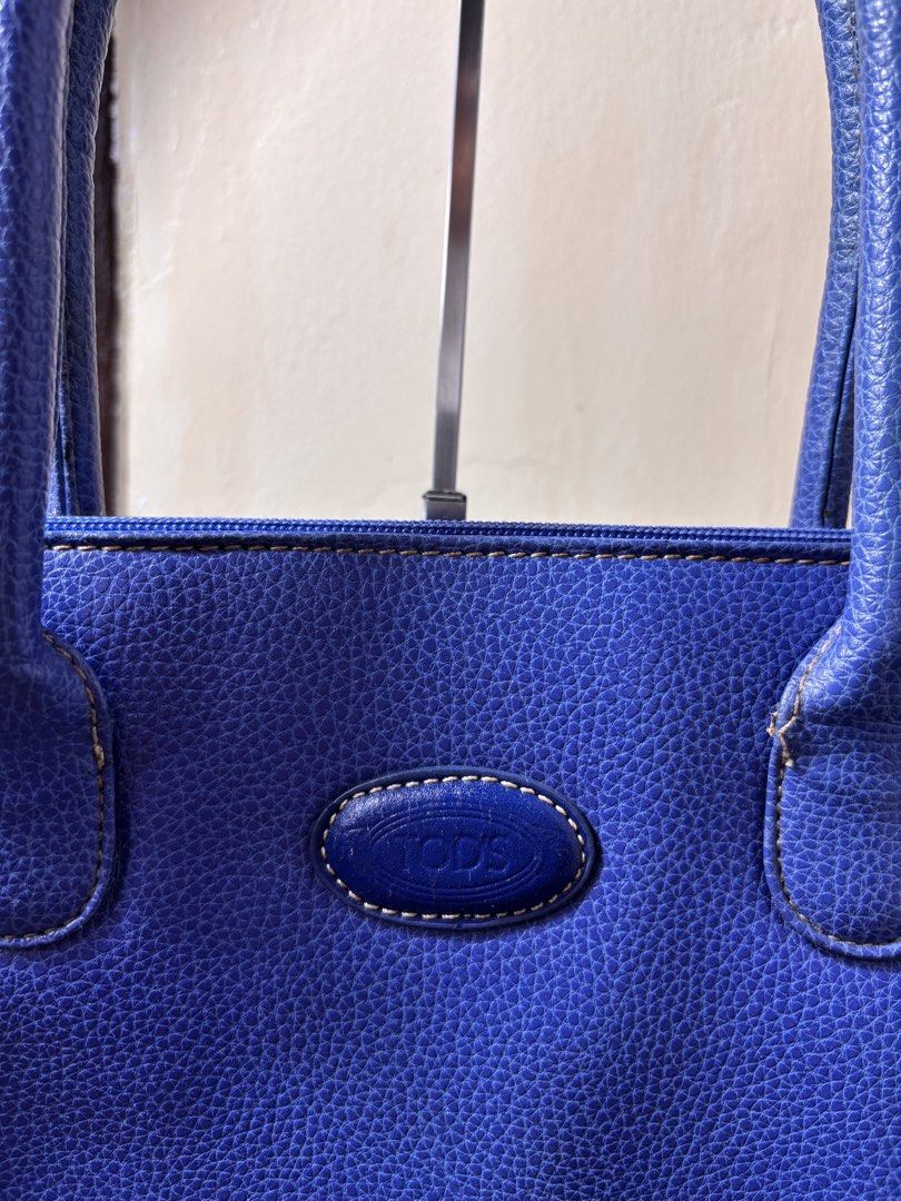 Tods HandBag (Category: Shoulder Bags) located in Manila. Submitted by earlylifecrisis3 (Listing ID 1465054960, Image 2). Description: Condition 8.5/10 Measure it by inch Width: 13.5 Length: 8 Depth: 3 Handle:6.5 •Refund / Returns not allowed allowed •Please do check the dimensions size on labels sometimes are not accurate on the sizing •Ask me before purchasing.