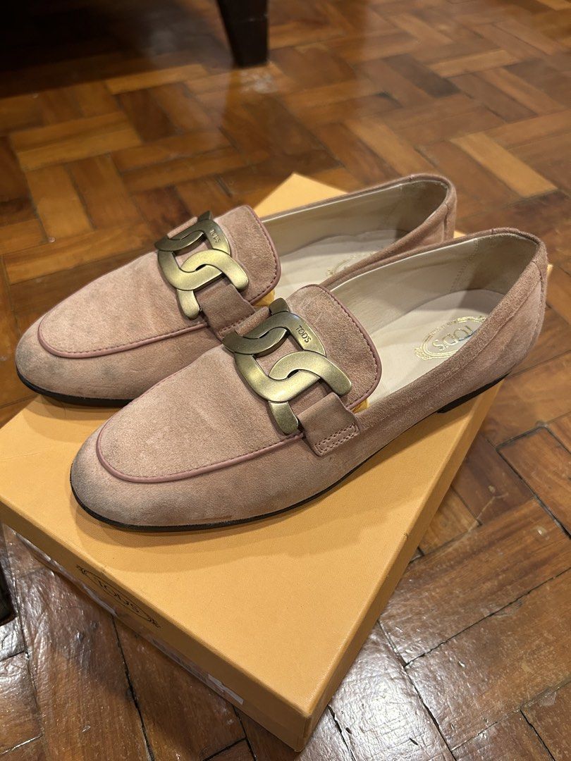 Tod's Suede Loafers Size 36 (Category: Loafers) located in Marikina City. Submitted by decluttering522 (Listing ID 1465006773, Image 2). Description: - Brand: Tod's - Style: Suede loafers with chunky gold-tone chain hardware - Color: Pinkish nude - Size: EU 36 - Condition: Heavy wear on soles, minor scuff marks near the toes - Inclusions: Original Tod's box and dust bag included.