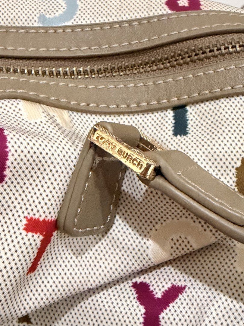 Tory Burch multicolor felt-alphabet canvas bag (Category: Tote Bags) located in Makati City. Submitted by banshee1411 (Listing ID 1465119953, Image 2). Description: Preloved / Authentic Multicolor Felt Alphabet Canvas Shoulder/Carryall Bag • Detachable & adjustable shoulder strap — can be worn handheld or crossbody/shoulder • Gold-tone Tory Burch hardware • Top zipper closure CONDITION: Preloved / Good overall condition ⚠️ PLEASE READ: Has visibl