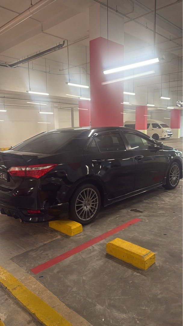 Toyota Corolla Altis 1.6 50th Anniversary Edition (A) (Category: Used Cars) located in Singapore. Submitted by dancinginpajamas (Listing ID 1464980554, Image 3). Description: Rare 50th Anniv Altis. 100% accident-free, meticulously maintained & used strictly for family. Features exclusive bodykit, O.Z. rims, TRD spoiler & White Pearl paint. Interior upgraded with premium carbon steering wheel. Performance enhanced with fully LTA-approved Tanabe le