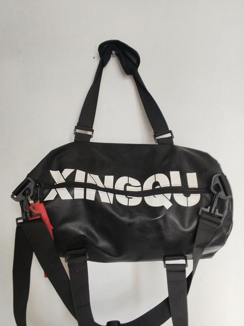 Travel bag/ gym bag (Category: Belt bags, Clutches and Pouches) located in Cavite. Submitted by bagssection04 (Listing ID 1465013519, Image 1). Description: Travel bag or Gym bag drak gray color large size like new condition.