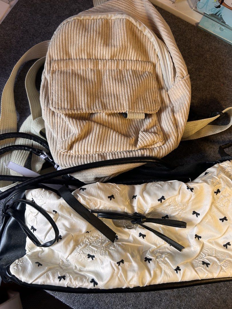 Two Small Bags Bundle (Category: Backpacks) located in Abulug. Submitted by dianne1215 (Listing ID 1464988363, Image 2). Description: Beige corduroy mini backpack and white bow shoulder bag bundle for take all no issue, needs cleaning lang since natambak sila.